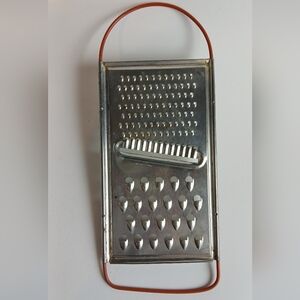 Vintage Metallic Cheese Grater with Red Handles